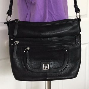 Black leather multi pocketed shoulder purse. EUC